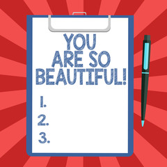 Conceptual hand writing showing You Are So Beautiful. Business photo text Flirting beauty appreciation roanalysistic feelings Sheet of Bond Paper on Clipboard with Ballpoint Pen Text Space