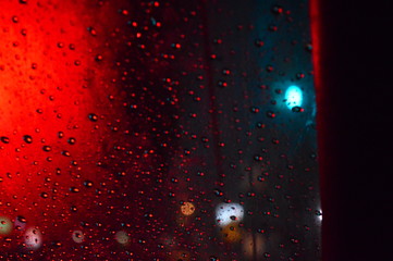 Fototapeta na wymiar Bokeh redlight rain