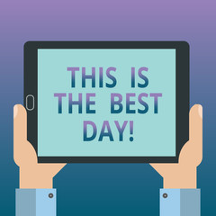 Handwriting text writing This Is The Best Day. Concept meaning Motivation inspiration for a good moment enjoy Hu analysis Hand Holding Blank Screen Tablet Smartphone Display Unit photo