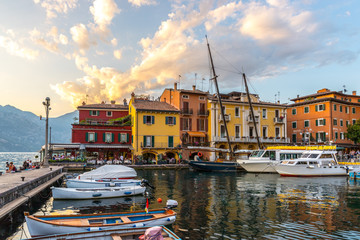 Fototapeta na wymiar Cute italian village Malcesine at lago di garda: colourful houses and harbor