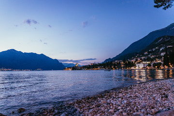 Evening scene at lago di garda: Beach, lake and village