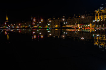 Fototapeta na wymiar Night reflections in the centre of Bordeaux, France. 