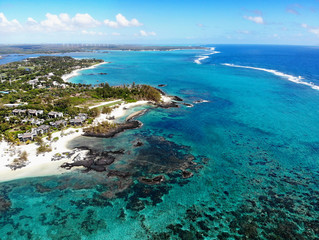 Fototapeta na wymiar Mauritius Island. Beautiful coastline and beach from helicopter.