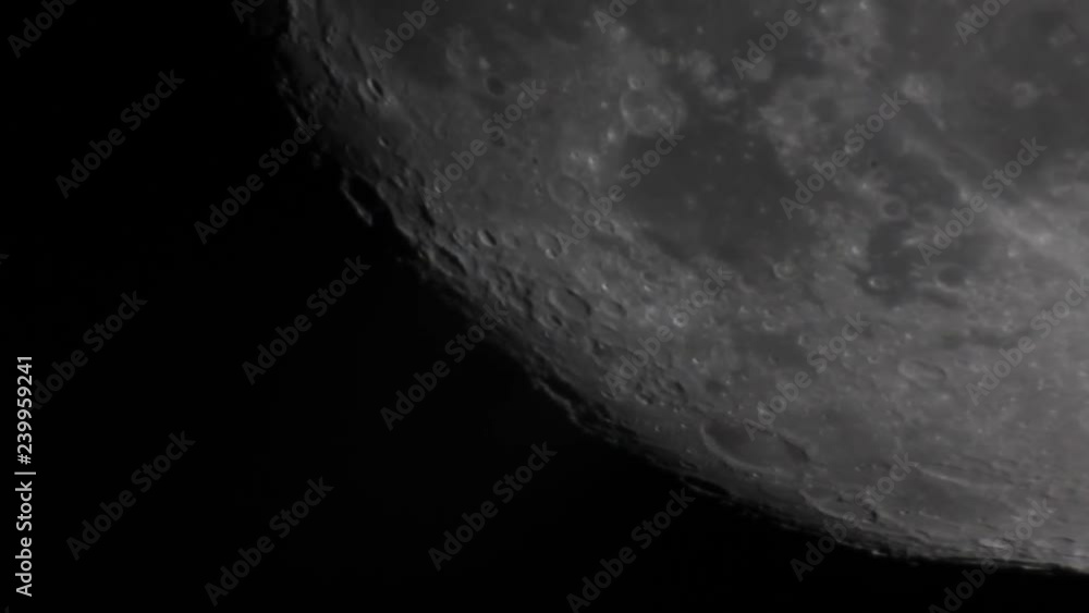 Wall mural detail of the part of the moon with many craters and some of turbolonce, taken with telescope in dar