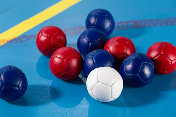 Boccia. Close up of little balls for playing boccia. Tricolor.