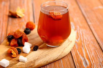 A glass of dried fruit compote.
