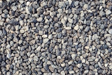Background with different and small sea pebbles
