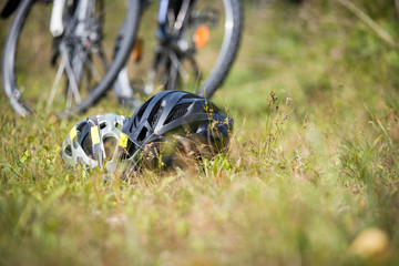 Bike helmets in the grass, bike tour