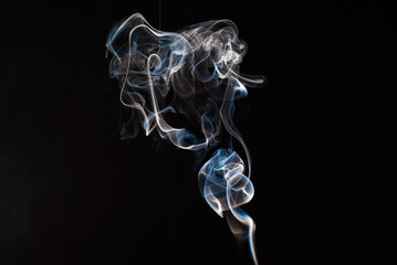 Smoke fragments on a black background