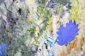 multi-colored strokes of oil paint on the artist's palette. background