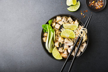 Tofu asian vegetarian soup served in bowl