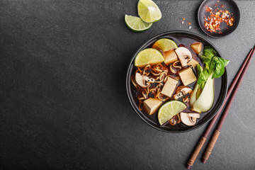 Tofu asian vegetarian soup served in bowl