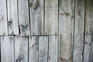 Fototapeta premium Old vintage wooden planks of the house. Grey wood texture background.