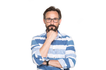 Portrait of thoughtful bearded man with fist under his chin