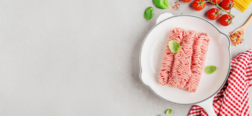 Fresh minced meat with spices on table