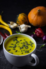 Pumpkin asian coconat cream soup. Autumn hot food