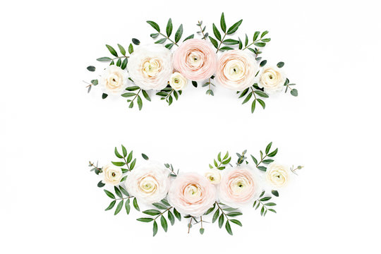 Floral frame wreath of pink ranunculus flower buds and eucalyptus on white background. Flat lay, top view mockup. Frame of flowers.