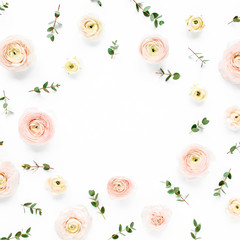 Floral frame made of pink ranunculus flower buds and eucalyptus branches on white background. Flat lay, top view mockup. Frame of flowers.