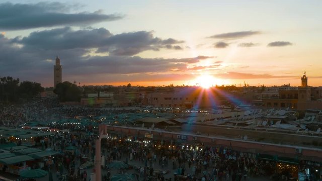 Jemaa el Fna square and the Koutoubia Mosque in Marrakech at sunset time