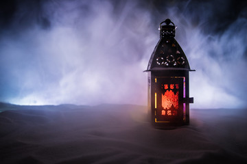 New Year's still-life postcard red lamp candle wax-boxes gift-box Christmas tree light bulbs lights wooden background snow