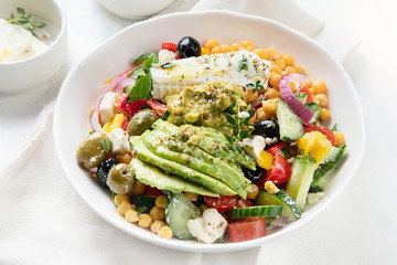 Salad with chickpeas, feta and avocado