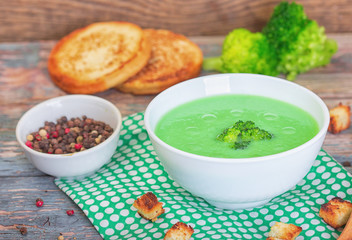 Bowl of cream of broccoli soup. Concept of healthy eating or vegetarian food