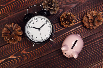 piggy bank with Christmas decoration background. Christmas composition.