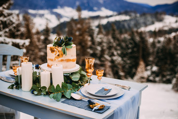 Pretty wedding decor in the winter style in the mountains