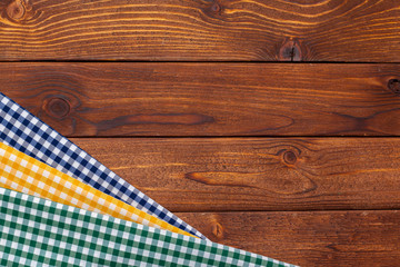checkered tablecloth on wooden table