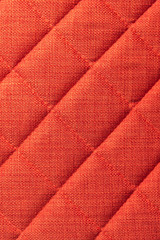 Close-up Furniture fittings - backrest upholstered sofa. Abstract red texture design