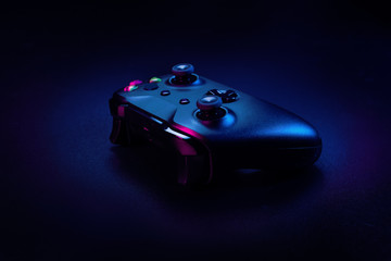 modern gamepad on a dark background © NewFabrika