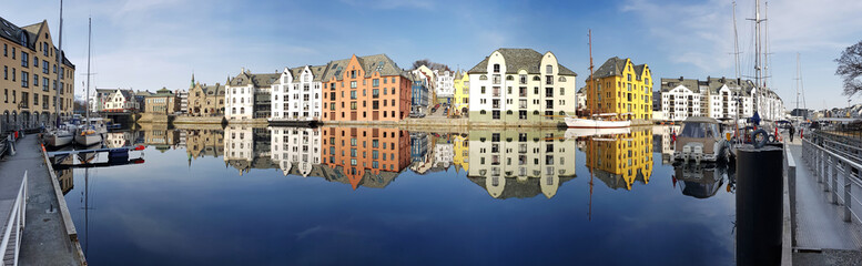 Panorama of the Alesund town reflected in the water, Norway