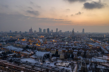 Fototapeta na wymiar widok na Warszawa zachód słońca z drona pierwszy śnieg
