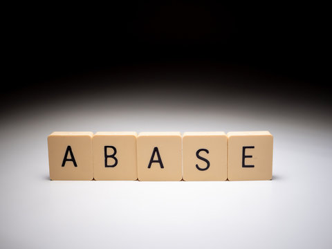 Closeup of abase word with elegant lightning. Abase concept