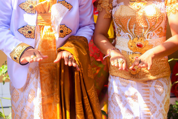 Traditional Balinese wedding, ritual with coins, Bali, Indonesia