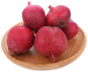 Fresh red radishes on white background