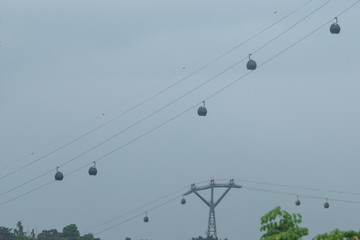 Cable cars connecting Singapore island and Sentosa island.