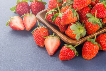 A beautiful and delicious strawberries set isolated on colorful background, close up, macro, copy space.