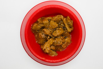 Wet food for dogs and cats in a bowl close up