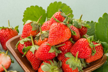 A beautiful and delicious strawberries set isolated on colorful background, close up, macro, copy space.