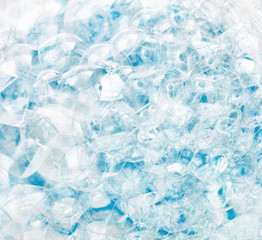 Abstract background of blue soap bubbles. Concept of cleansing