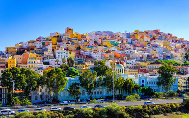 Gran Canaria many colorful houses in Ciudad alta, Las Palmas. Sunny view of the picturesque old town. - obrazy, fototapety, plakaty