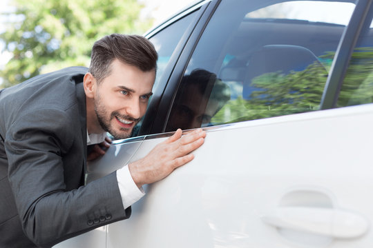 Business Man Obsessing About Cleanliness Of Car