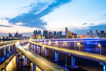 busy traffic road with city skyline