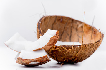 fresh open coconut on a white background