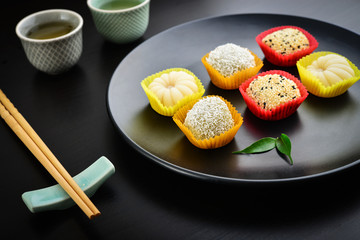 Mochi assortment on plate with chopticks