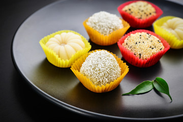Mochi assortment on plate with chopticks