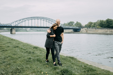 Happy couple. Loving couple enjoying in moments of happiness in the park. Love and tenderness, dating, romance. Lifestyle concept