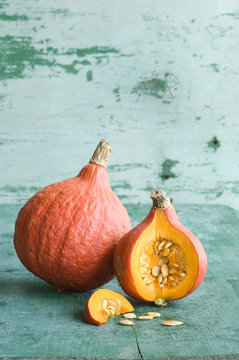 Whole and sliced Hokkaido pumpkin