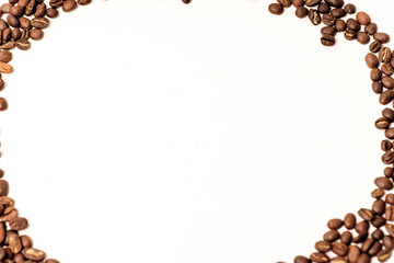 brown coffee beans on a white background